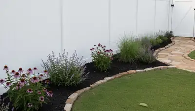New white wooden privacy fence installation by landscaping pros in Fort Worth, TX